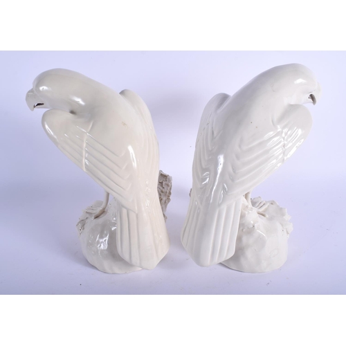 1108 - A PAIR OF 19TH CENTURY CHINESE BLANC DE CHINE PORCELAIN FIGURES OF BIRDS modelled upon naturalistic ... 