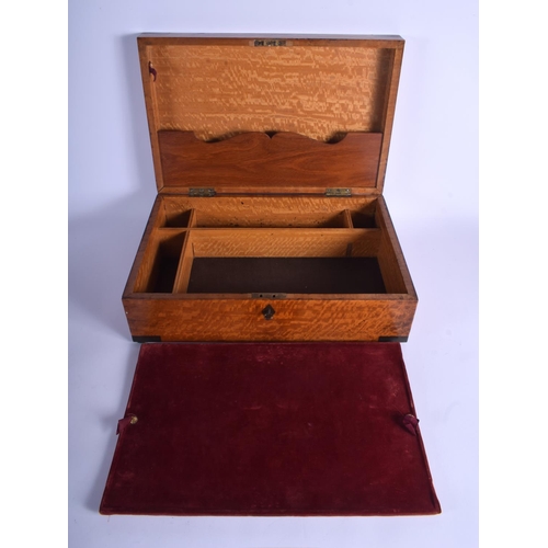 481 - A VICTORIAN SATINWOOD BRASS BOUND BOX modelled in the Campaign style. 44 cm x 25 cm.