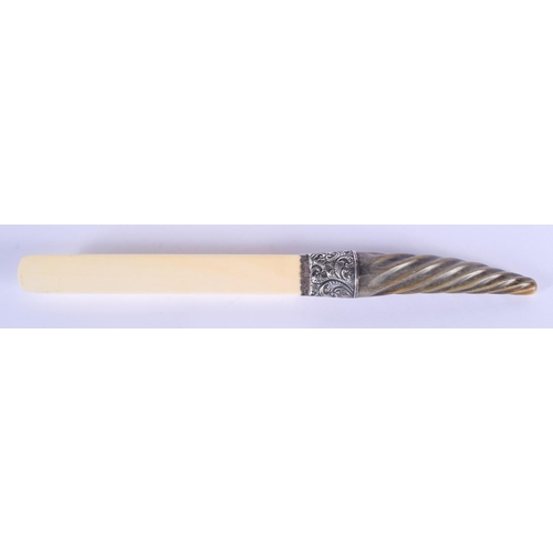 491 - AN ANTIQUE CARVED CONTINENTAL RHINOCEROS HORN AND IVORY PAPER KNIFE. 35 cm long.