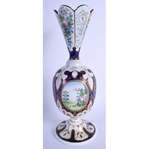 5 - A RARE LARGE 19TH BOHEMIAN ENAMELLED BLUE GLASS VASE painted with flowers and scrolling motifs. 33 c... 