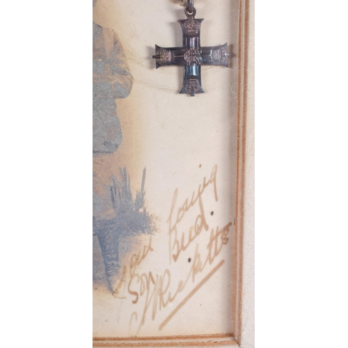 502 - A MILITARY CROSS within a frame, Major General Perrira. 33 cm x 18 cm.