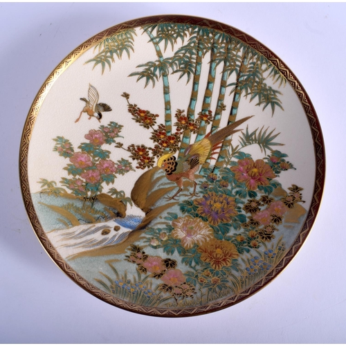 1129 - A 19TH CENTURY JAPANESE MEIJI PERIOD SATSUMA DISH painted with birds within landscapes. 20 cm diamet... 