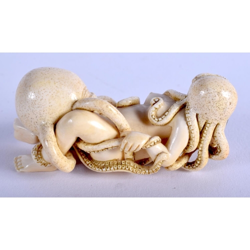 1130 - AN EARLY 20TH CENTURY JAPANESE MEIJI PERIOD CARVED IVORY NETSUKE modelled as a pair of squid perform... 