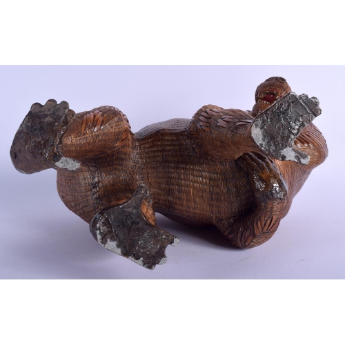 511 - A LOVELY EARLY 20TH CENTURY CONTINENTAL WICKER FIGURE OF A BABOON modelled with a young upon its bac... 