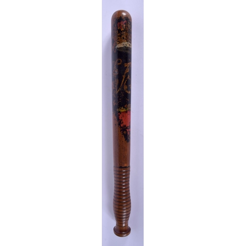 518 - AN ANTIQUE PAINTED WOOD TRUNCHEON. 37 cm long.