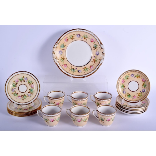 52 - A 19TH CENTURY CONTINENTAL PORCELAIN TEASET painted with flowers upon a cream ground. Largest 24 cm ... 