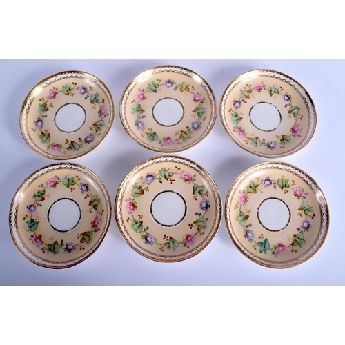 52 - A 19TH CENTURY CONTINENTAL PORCELAIN TEASET painted with flowers upon a cream ground. Largest 24 cm ... 