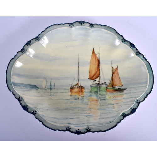 54 - A RARE ROYAL CROWN DERBY PORCELAIN OVAL DISH probably by W E J Dean, painted with sailing boats. 26 ... 