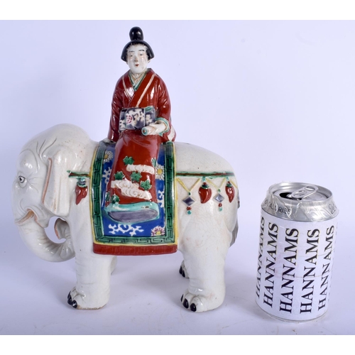 1186 - AN UNUSUAL 19TH CENTURY JAPANESE AO KUTANI PORCELAIN FIGURE modelled as a geisha upon an elephant. 2... 