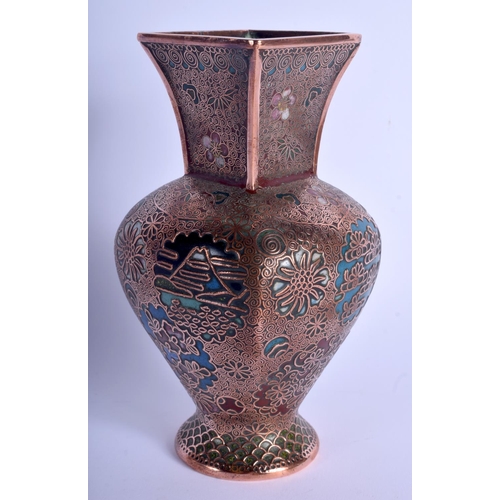 1189 - AN EARLY 20TH CENTURY JAPANESE MEIJI PERIOD MIXED METAL VASE enamelled with foliage. 15 cm high.