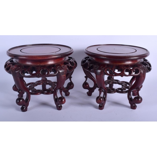 1204 - A PAIR OF EARLY 20TH CENTURY CHINESE HARDWOOD STANDS Late Qing/Republic. 20 cm x 17 cm.