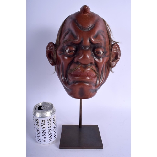 1221 - A LOVELY 18TH CENTURY JAPANESE EDO PERIOD RED LACQUERED NOH MASK modelled as a scowling male. Mask 2... 