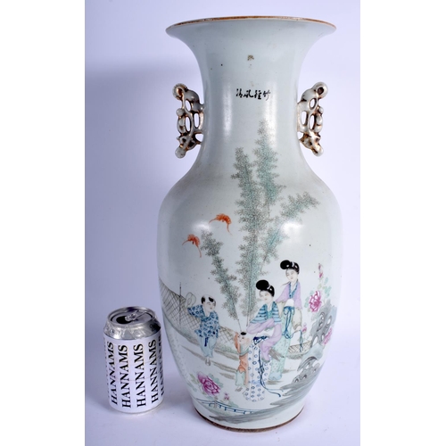 1223 - A LARGE CHINESE REPUBLICAN PERIOD FAMILLE ROSE VASE painted with figures within landscapes. 43 cm x ... 