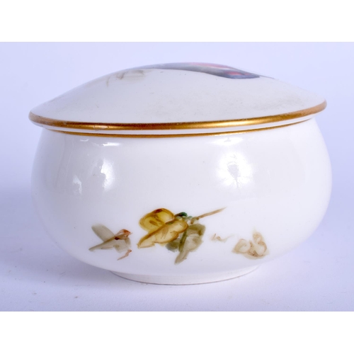 61 - A ROYAL WORCESTER PORCELAIN BOX AND COVER painted with a bird. 8 cm wide.