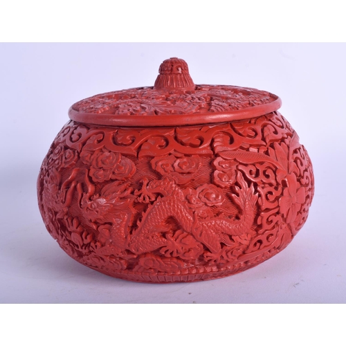 1228 - AN EARLY 20TH CENTURY CHINESE CARVED RED LACQUER BOX AND COVER possibly cinnabar, decorated with dra... 