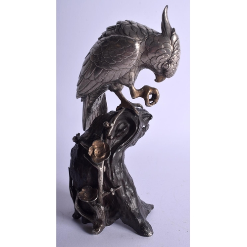 1231 - A 19TH CENTURY JAPANESE MEIJI PERIOD SILVERED OKIMONO OF A BIRD modelled upon an alloy base. 22 cm h... 