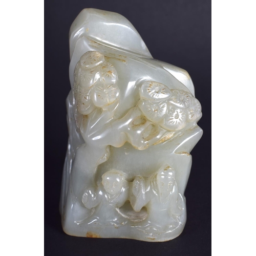 1237 - AN EARLY 20TH CENTURY CHINESE CARVED GREEN JADE MOUNTAIN Late Qing. 8 cm x 4 cm.