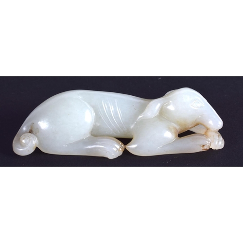 1239 - AN EARLY 20TH CENTURY CHINESE CARVED GREENISH WHITE JADE HOUND Late Qing/Republic. 7.25 cm wide.