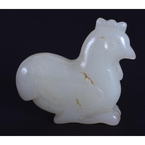 1243 - A CHINESE CARVED WHITE JADE FIGURE OF A BIRD 20th Century. 4 cm x 3 cm.