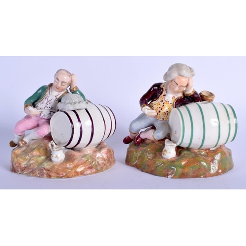 64 - A RARE PAIR OF 19TH CENTURY ENGLISH PORCELAIN FIGURES modelled as two drunken males upon barrels. 8 ... 