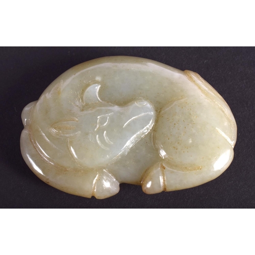 1267 - A 19TH CENTURY CHINESE GREEN JADE FIGURE OF A STYLISED BULL Qing. 5.5 cm x 4.25 cm.