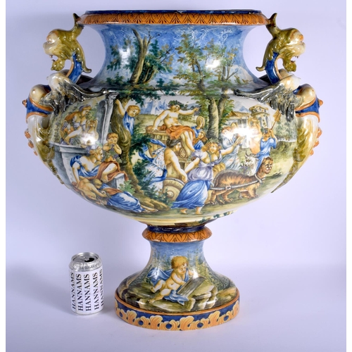 127 - A VERY LARGE 19TH CENTURY ITALIAN TWIN HANDLED MAJOLICA VASE painted with figures within landscapes.... 