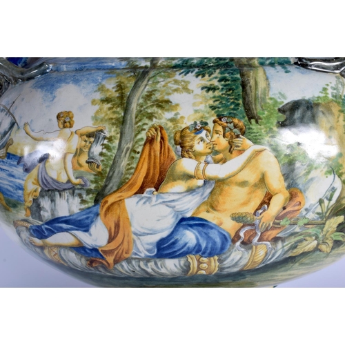 127 - A VERY LARGE 19TH CENTURY ITALIAN TWIN HANDLED MAJOLICA VASE painted with figures within landscapes.... 