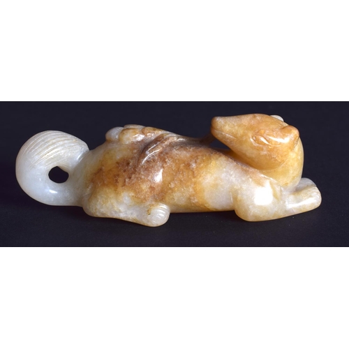 1272 - A CHINESE CARVED WHITE JADE FIGURE OF A STYLISED ANIMAL 20th Century. 5.5 cm wide.