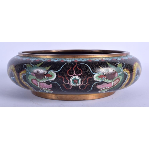 1307 - A LARGE EARLY 20TH CENTURY CHINESE CLOISONNE ENAMEL BOWL decorated with dragons. 23 cm diameter.