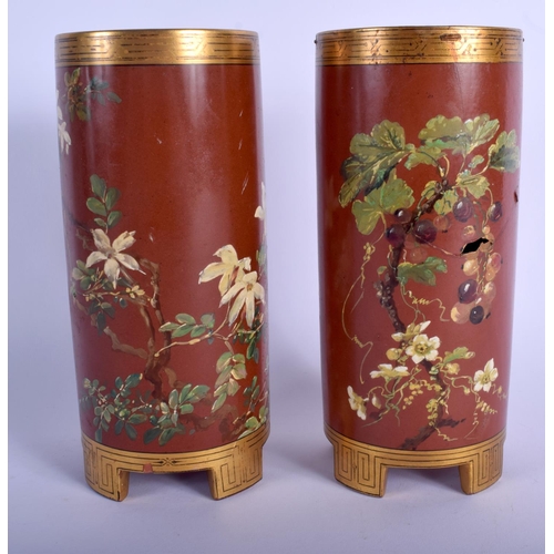 67 - A RARE PAIR OF MINTON ARTS AND CRAFTS POTTERY VASES enamelled with fruiting vines. 20 cm high.