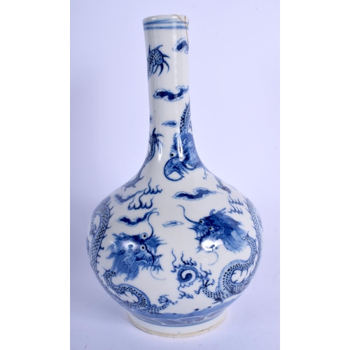 1323 - A 19TH CENTURY CHINESE BLUE AND WHITE PORCELAIN VASE bearing Kangxi marks to base. 21 cm high.