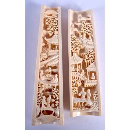 1343 - A LOVELY PAIR OF 19TH CENTURY CHINESE CARVED IVORY WRIST RESTS Qing. Largest 20 cm long.