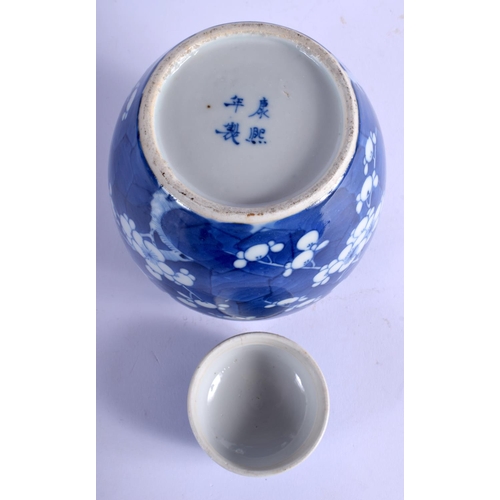 1355 - A 19TH CENTURY CHINESE BLUE AND WHITE PORCELAIN GINGER JAR AND COVER bearing Kangxi marks to base. 1... 