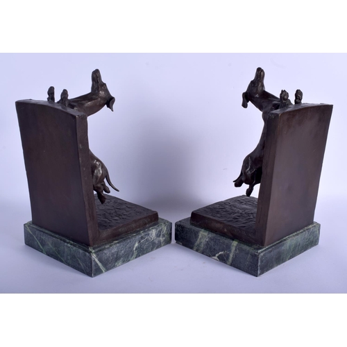 745 - A PAIR OF CONTEMPORARY CONTINENTAL BRONZE DOG BOOK ENDS. 31 cm x 16 cm.