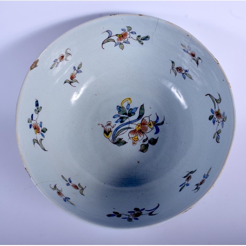 78 - A LARGE DELFT TIN GLAZED NELSON POTTERY BOWL possibly 19th century, painted with foliage and ships. ... 