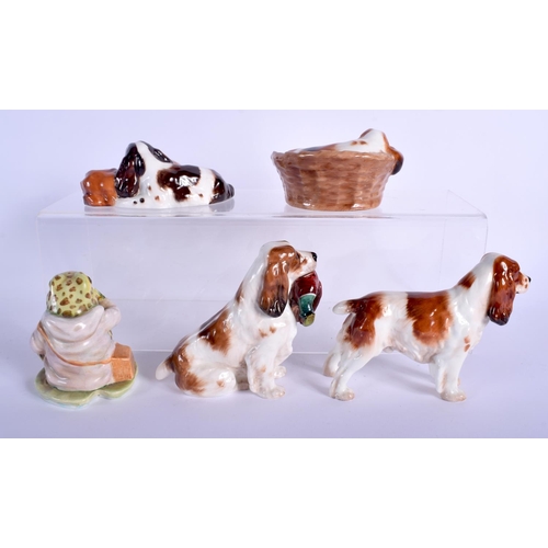 93 - FOUR ROYAL DOULTON DOGS together with a Beswick toad. (5)