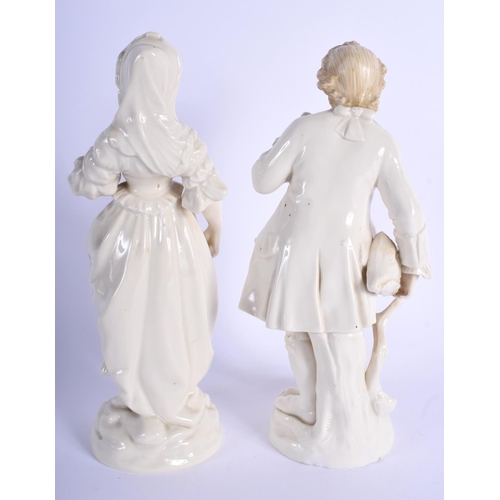 99 - A PAIR OF 19TH CENTURY CONTINENTAL PORCELAIN FIGURES possibly German or Austrian. 22 cm high.