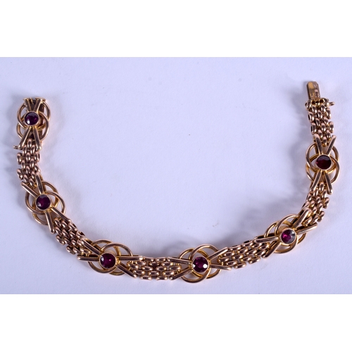 2125 - AN ANTIQUE 9CT GOLD AND AMETHYST BRACELET. 14.3 grams. 19.5 cm x 1.2 cm.