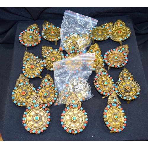 3008 - Quantity of Tibetan bronze decorative plaques.  11.5cm