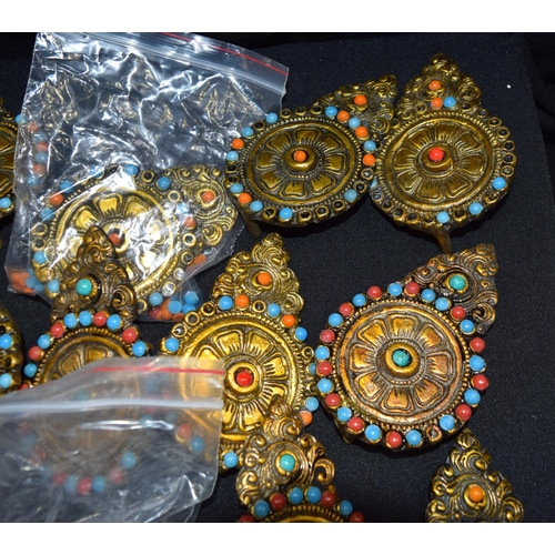 3008 - Quantity of Tibetan bronze decorative plaques.  11.5cm