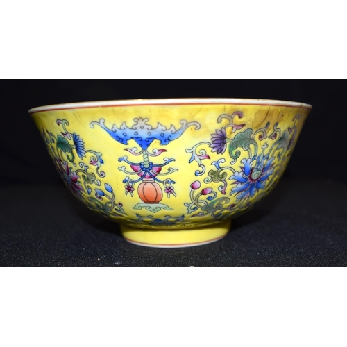 3013 - Chinese Yellow ground dragon plate and Famille Jaune bowl foliage decorated.  16.5cm