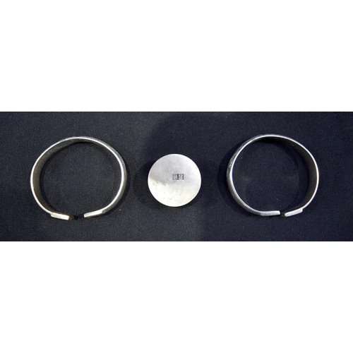 3020 - Two Chinese white metal bangles and a white metal coin box