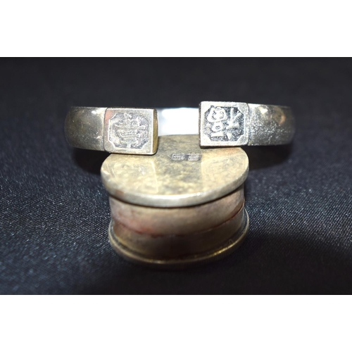 3020 - Two Chinese white metal bangles and a white metal coin box