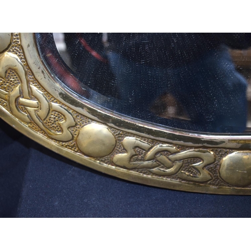 3057 - Brass surround bevelled mirror.  60cm x 39cm