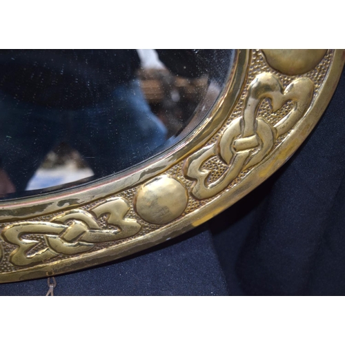 3057 - Brass surround bevelled mirror.  60cm x 39cm