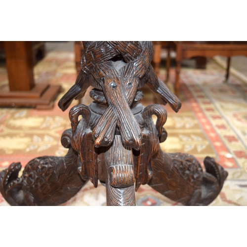 3115 - Burmese carved Table with ornate dragon legs and foliage to top.  68cm x 70cm