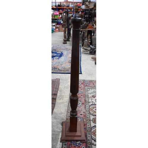 3116 - A wooden Lampstand.  152 cm high