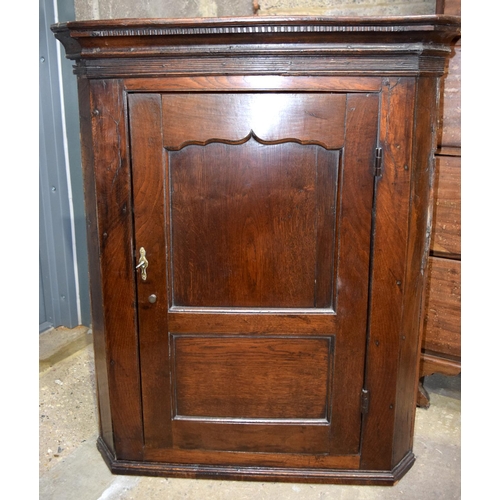 3121 - An 18th C Oak hanging Cupboard.  97cm x 79cm