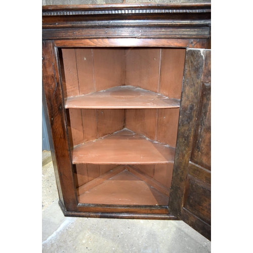 3121 - An 18th C Oak hanging Cupboard.  97cm x 79cm