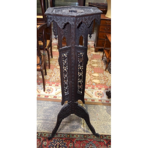 3125 - Ornately carved Middle Eastern Pot Stand with foliage pattern.  129cm x 42cm